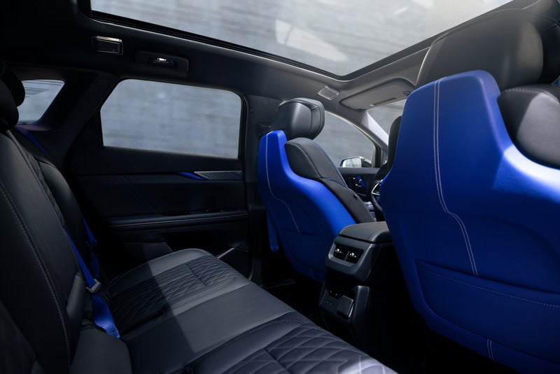 Back Seat View of the 2026 OPTIQ-V Blue Front Seats, Sun Roof, and Interior | Bergstrom Cadillac of Oshkosh in Oshkosh WI